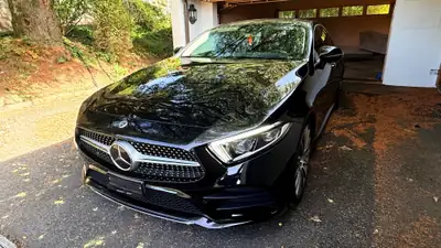Mercedes-Benz CLS 450 AMG Line 4Matic — Berline élégante, moteur hybride et équipements premium — rear view