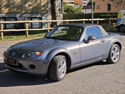 Mazda MX-5 1.8 Confort — Roadster iconique, 76 400 km, toit électrique — côté