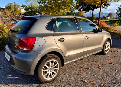 VW Polo 1.2 TSI 105 DSG — Citadine automatique fiable, MFK valide, équipée Navi — fianco