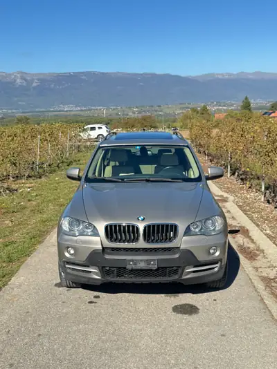 BMW X5 3.0d E70 — SUV prestige 7 places, motorisation robuste et capacité de remorquage — side view