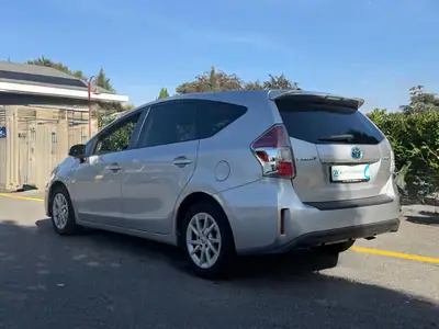 Toyota Prius+ 1.8 VVT-i HSD Premium — Monospace hybride 7 places, 156'000 km — intérieur