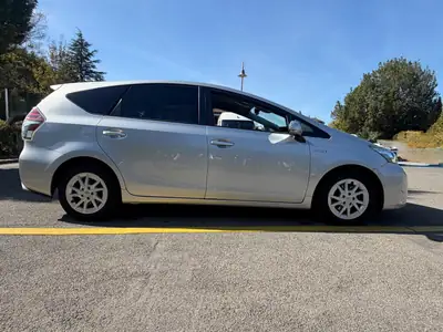 Toyota Prius+ 1.8 VVT-i HSD Premium — Monospace hybride 7 places, 156'000 km — Miniature 7