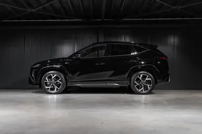 Hyundai Tucson 1.6 TGDI 48V N-Line — SUV compact hybride léger, quasi neuf — Heckansicht