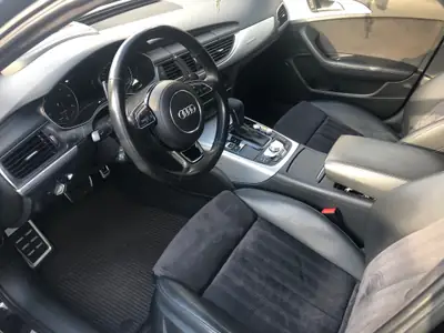Audi A6 Allroad 3.0 BiTDI V6 Quattro — Break premium 320 ch, tout-terrain élégant — Heckansicht
