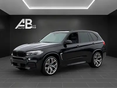 BMW X5 xDrive 50i M-Sportpaket — SUV premium 450 ch, entretien complet — côté
