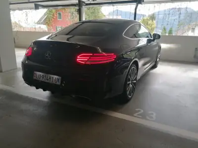 Mercedes-Benz C 200 AMG Line 4Matic — Coupé sportif, transmission automatique, 4WD — fianco