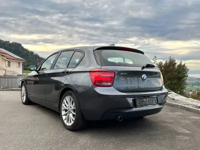 BMW 118d xDrive 2014 — Diesel efficace, transmission manuelle, traction intégrale — fianco