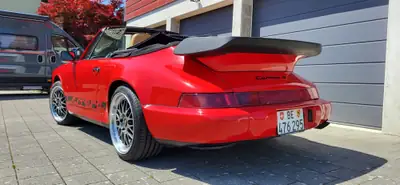 Porsche 911 Carrera 4 Cabriolet 3.6 — Chef-d'œuvre des années 90, 250 ch et toit ouvert — side view