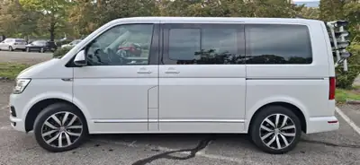 VW T6 2.0 TDI 150 — Monospace robuste, faible kilométrage, motorisation éprouvée — Heckansicht