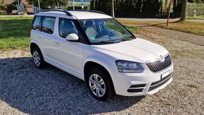 Skoda Yeti 2.0 TDI 110 Active 4x4 — SUV compact robuste, 4 roues motrices et attelage — side view