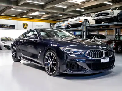 BMW M850i xDrive — Coupé sportif 530 ch, full options, faible kilométrage — Heckansicht