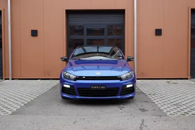 VW Scirocco 2.0 TSI R — Coupé sportif 265 ch, toit ouvrant et phares Xenon — side view