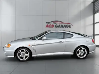 Hyundai Coupé 2.7 24V FX — Coupé sportif automatique, impeccable et économique — Heckansicht