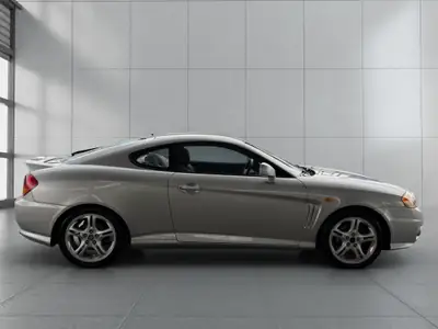 Hyundai Coupé 2.7 24V FX — Coupé sportif automatique, impeccable et économique — Miniatur 7
