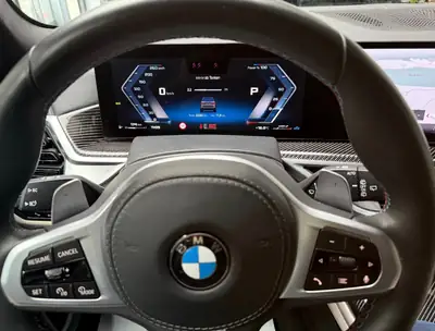 BMW X7 xDrive 48V M60i — SUV 7 places premium, 530 ch et technologie hybride — dashboard