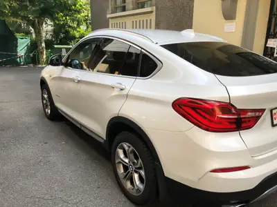 BMW X4 xDrive 20d Steptronic — SUV coupé diesel performant, 80 000 km — côté