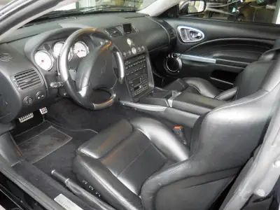 Aston Martin V12 Vanquish S — Coupé sport britannique légendaire, 23'000 km seulement — Miniatur 7