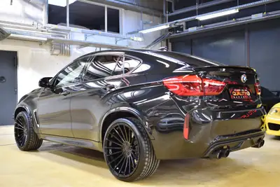 BMW X6M Steptronic — SUV coupé haute performance, 575 ch et équipements premium — arrière