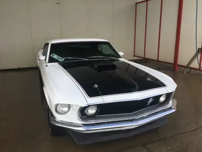 Ford Mustang Sportroof Mach 1 1969 — Légende américaine, V8 5.7L, histoire authentique — fianco