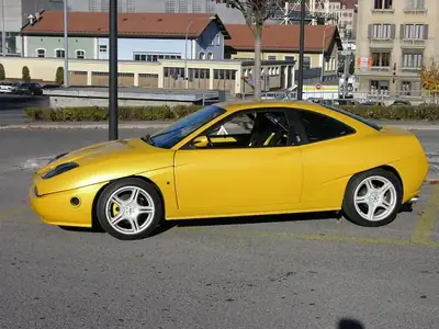 FIAT Coupé 2.0 16V Turbo — Légendaire sportive des années 90, jaune éclatant — Seitenansicht