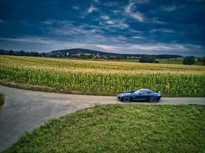 Mercedes-AMG GT Speedshift DCT — Coupé sportif 510 ch, kilométrage minimaliste — côté