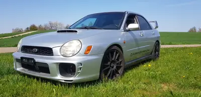 Subaru Impreza WRX STI 2001 — Légendaire 328 ch, 4WD Turbo, Investissement complet — vue extérieure