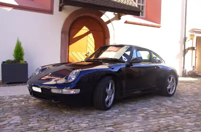 Porsche 911 Carrera 4S 1996 — Légende sportive avec moteur révisionné — Seitenansicht