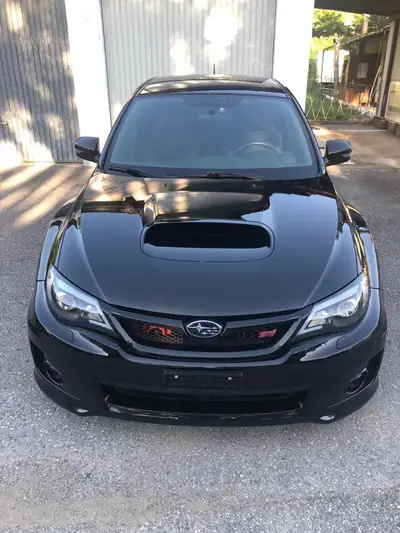 Subaru WRX STI Sport 2012 — Berline haute performance 4WD, 301 ch, boîte manuelle — Innenraum
