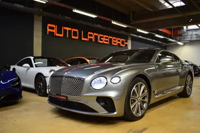 Bentley Continental GT 6.0 W12 — Le coupé de prestige britannique, 635 ch et histoire tracée — Miniature 11