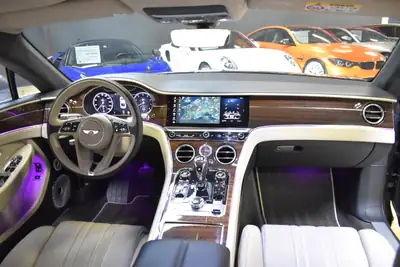 Bentley Continental GT 6.0 W12 — Le coupé de prestige britannique, 635 ch et histoire tracée — Miniature 16