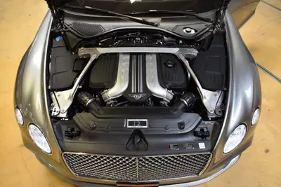 Bentley Continental GT 6.0 W12 — Le coupé de prestige britannique, 635 ch et histoire tracée — Miniature 32