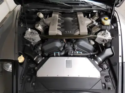 Aston Martin V12 Vanquish — Coupé britannique 470 ch, 57 000 km, parfait état — Miniatur 11