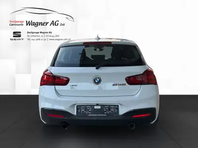 BMW M140 2019 — Berline sportive 340 ch, 129 500 km, transmission automatique — rear view