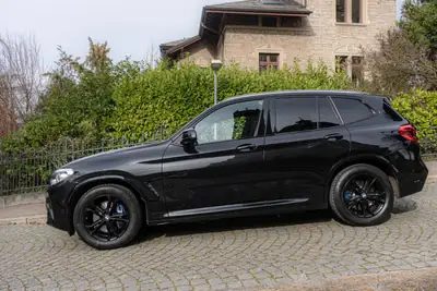 BMW X3 xDrive 30d — SUV premium diesel 6-cylindres, entretien impeccable et garantie jusqu'à 2027 — fianco