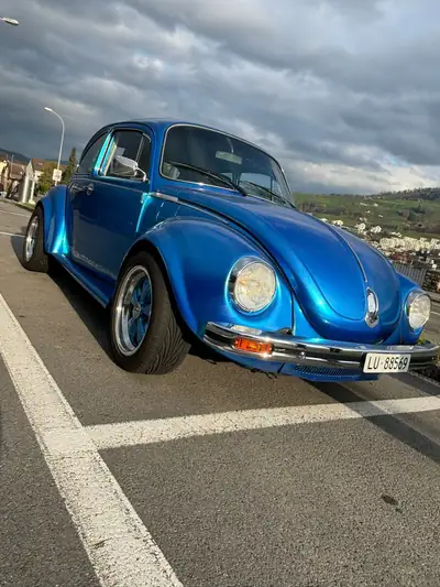 VW Käfer 1973 — Légende automobile bleue, 40'000 km d'histoire — côté