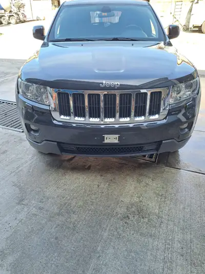 Jeep Grand Cherokee 2013 — SUV robuste 4x4, moteur diesel 241 ch — arrière