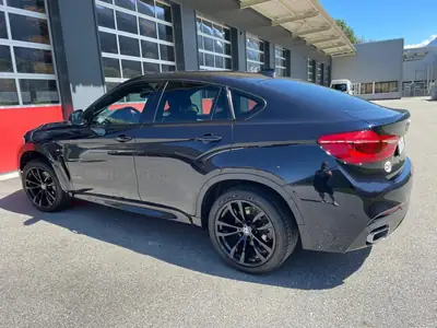 BMW X6 — SUV coupé puissant, diesel 313 ch, entretien BMW complet — fianco