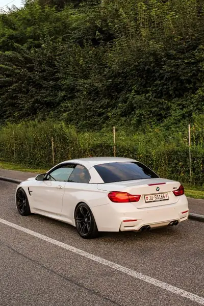 BMW M4 Cabriolet 2015 — Sportive décapotable 431 ch, rare et dynamique — côté