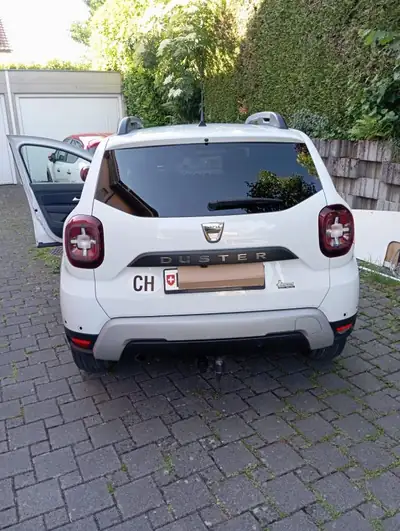 Dacia Duster 2021 — SUV robuste diesel 4×4, 110'000 km — côté