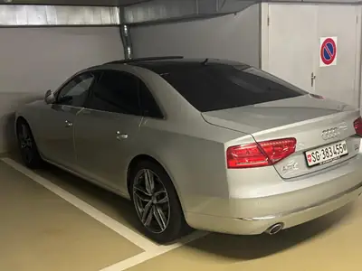 Audi A8 Diesel 350 ch — Berline prestige automatique, transmission intégrale — fianco