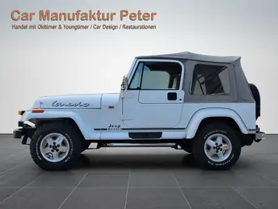 Jeep Wrangler Laredo 1992 — Légendaire 4x4 avec moteur 6 cylindres et faible kilométrage — côté