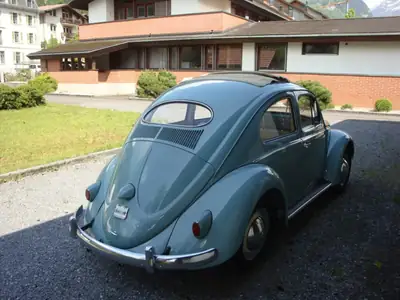 VW Käfer Oval 1955 — Légende restaurée, toit pliant d'origine — côté