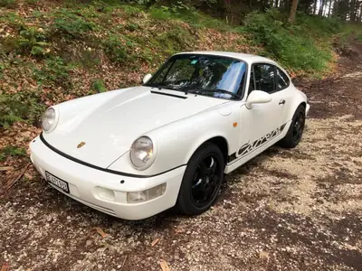 Porsche 911 Coupé 1989 — Légende des années 80, motorisation atmosphérique 250 ch — fianco