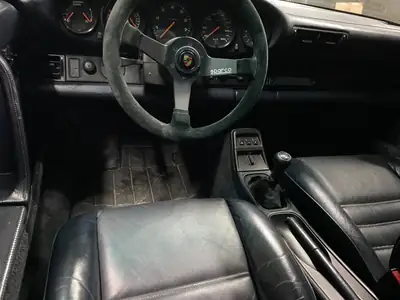 Porsche 911 Coupé 1989 — Légende des années 80, motorisation atmosphérique 250 ch — cruscotto