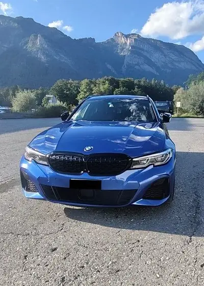BMW M340i xDrive Touring — Break sportif 374 ch, Portimao bleu, aménagements premium — vista esterna