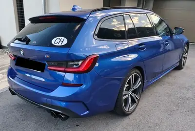 BMW M340i xDrive Touring — Break sportif 374 ch, Portimao bleu, aménagements premium — interni