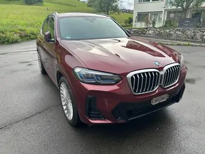 BMW X3 2023 — SUV hybride diesel performant, 33'200 km, rouge éclatant — Außenansicht