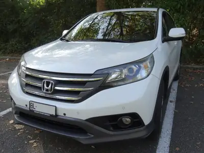 Honda CR-V 2.2 i-DTEC 4WD — SUV fiable, entretien complet, prêt à l'aventure — côté