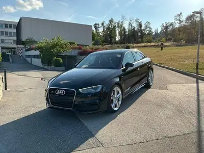Audi A3 Berline 180 ch — Élégance noire et performance automatique — Seitenansicht