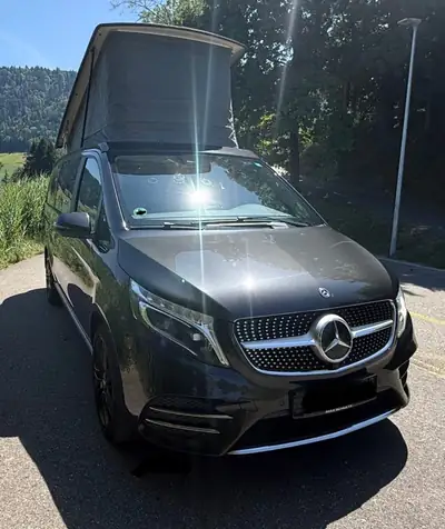 Mercedes-Benz Marco Polo — Camping-car premium 7 places, toit relevable et équipement complet — côté